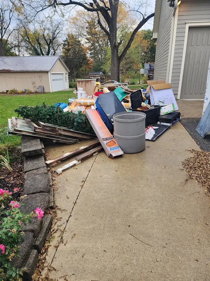 Dumpster being loaded with debris for 3 Yard Dumpster Rental in Lancaster